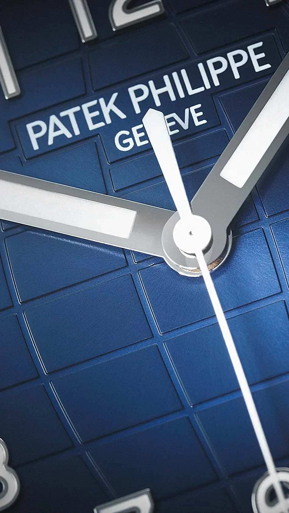 macro del centro de la esfera azul con motivo de cuadrícula, manecillas y firma Patek Philippe Genève