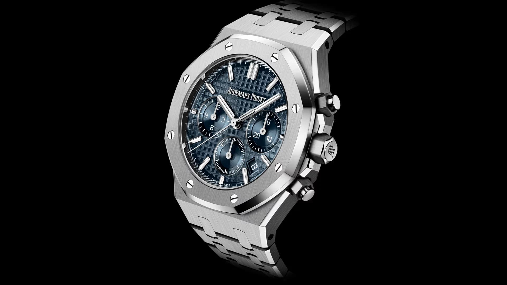 reloj Audemars Piguet Royal Oak de acero con esfera azul de motivo tapisserie, bisel octogonal atornillado, tres contadores cronógrafo, ventana de fecha y brazalete integrado de eslabones metálicos